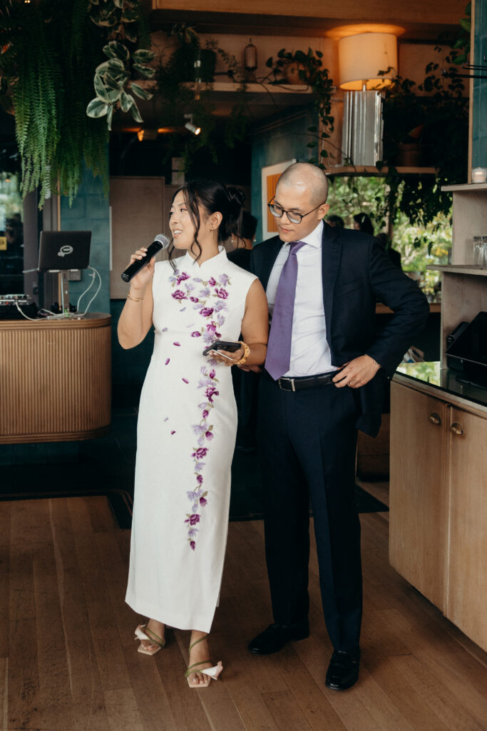Couple speaking at a Celestine DUMBO wedding reception 