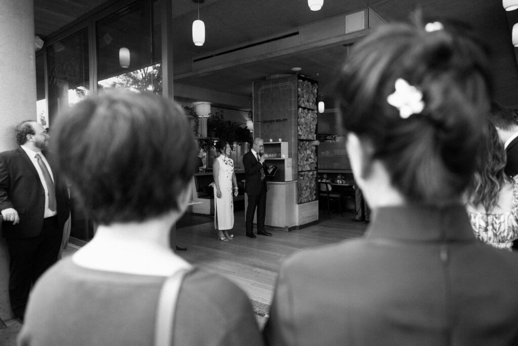 Couple speaking at a Celestine DUMBO wedding reception 