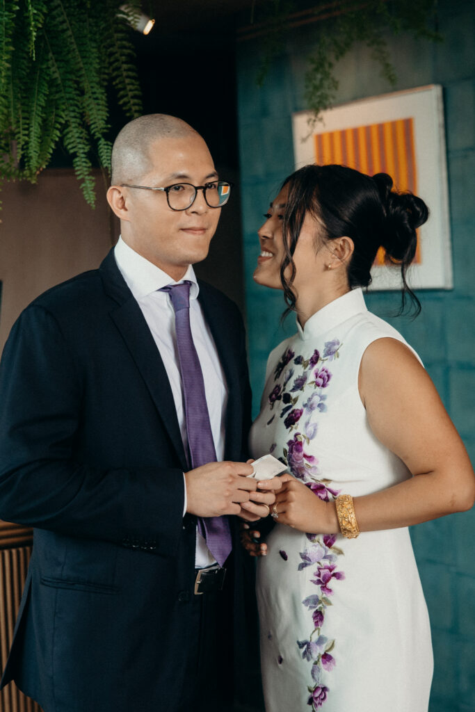 Brooklyn couple talking at a Celestine DUMBO wedding reception 