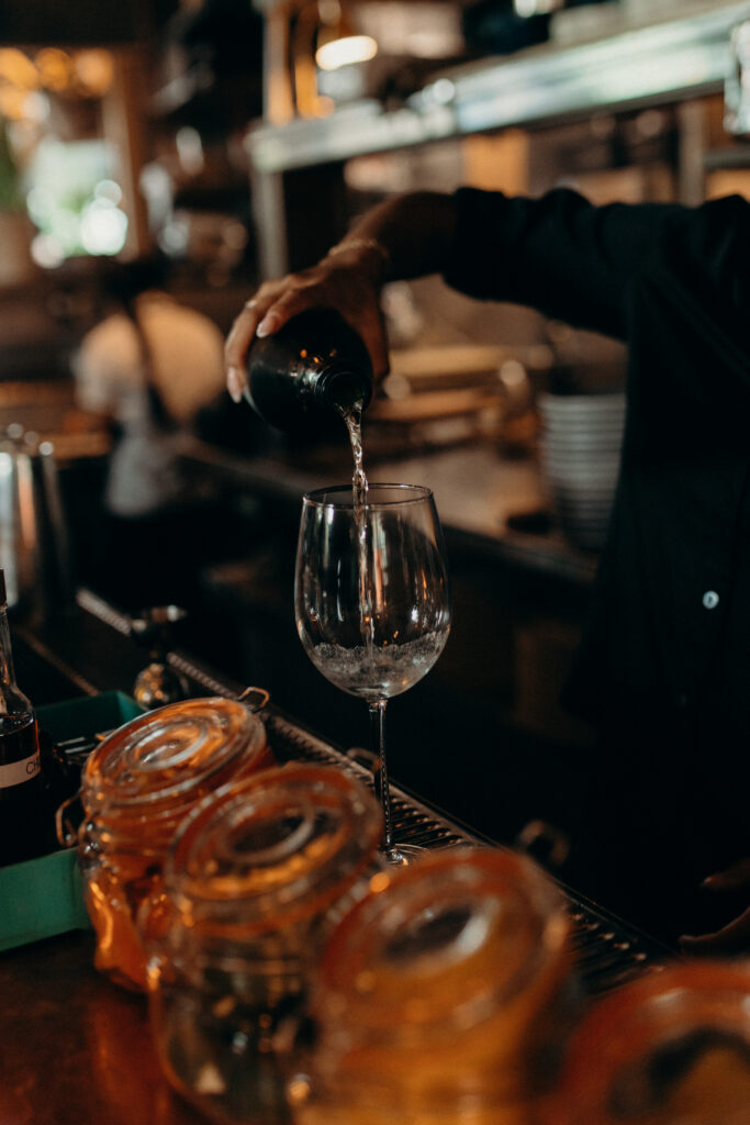 Bartender preparing drinks at a Celestine DUMBO wedding reception