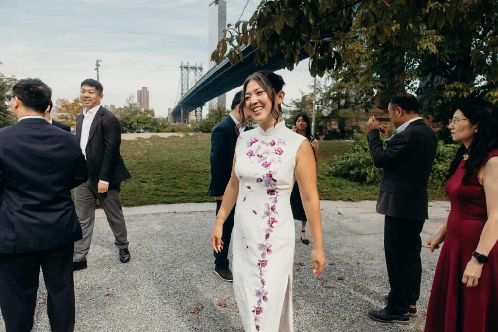 Brooklyn bride and wedding guests interacting at Celestine DUMBO