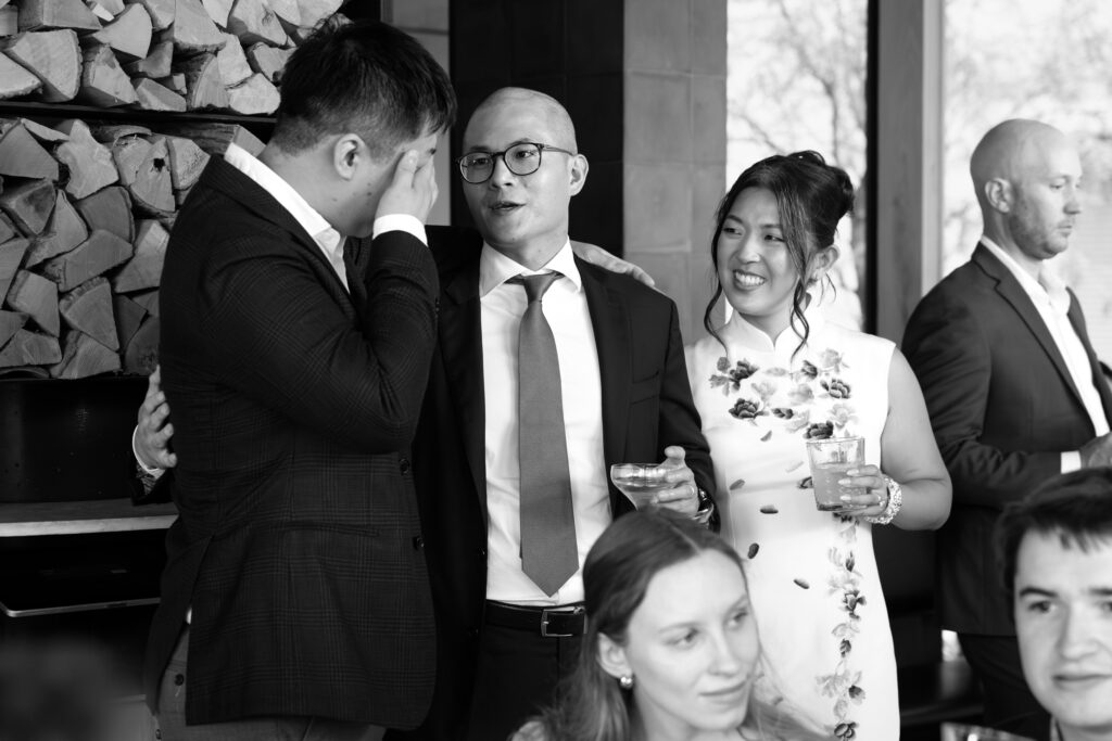 Brooklyn couple and wedding guests interacting at a Celestine DUMBO wedding reception 