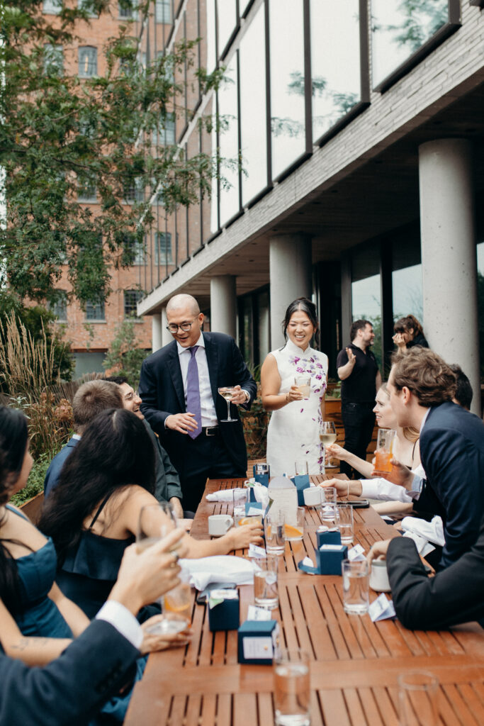 Brooklyn couple and wedding guests interacting at a Celestine DUMBO wedding reception 