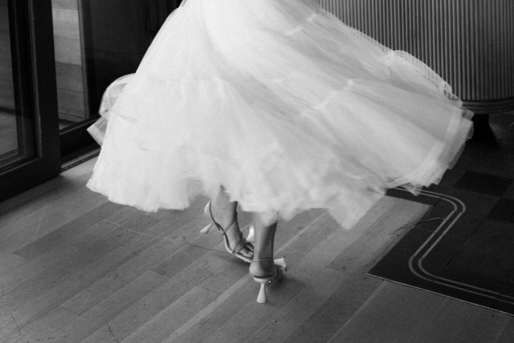 Brooklyn bride twirling her dress at a Celestine DUMBO wedding reception