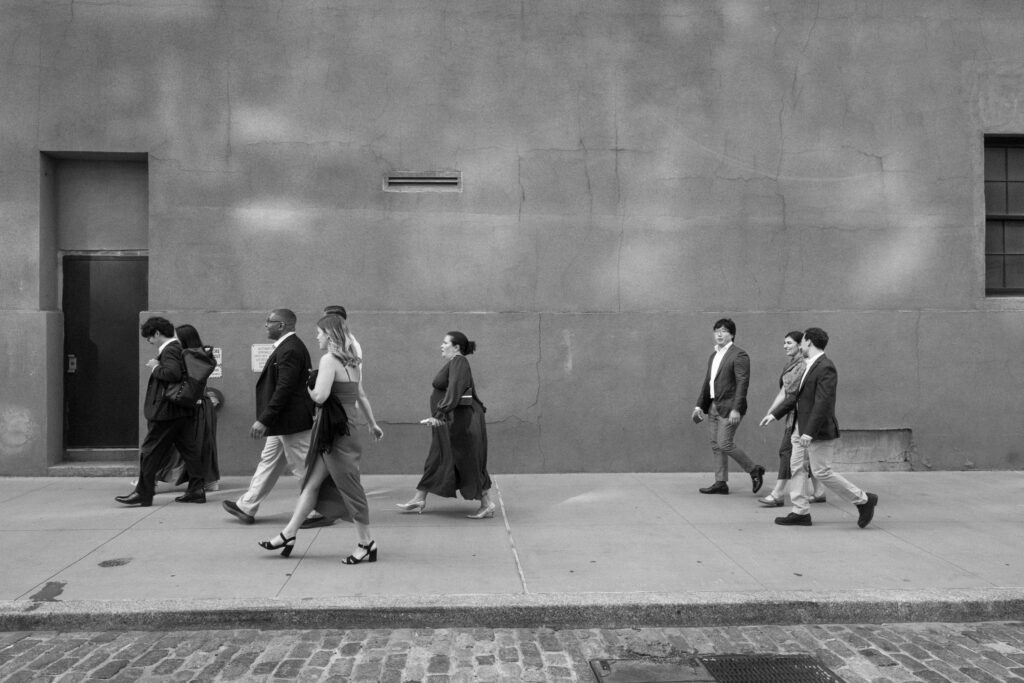 Wedding guests walking outside the wedding venue at Celestine DUMBO