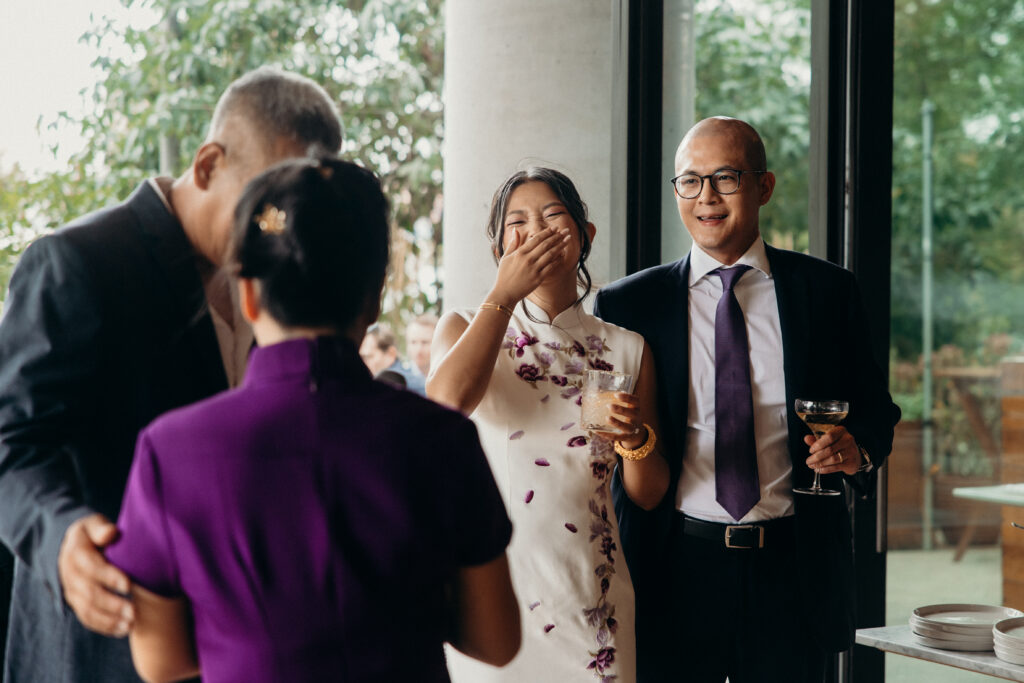 Brooklyn couple and wedding guests interacting at a Celestine DUMBO wedding reception 
