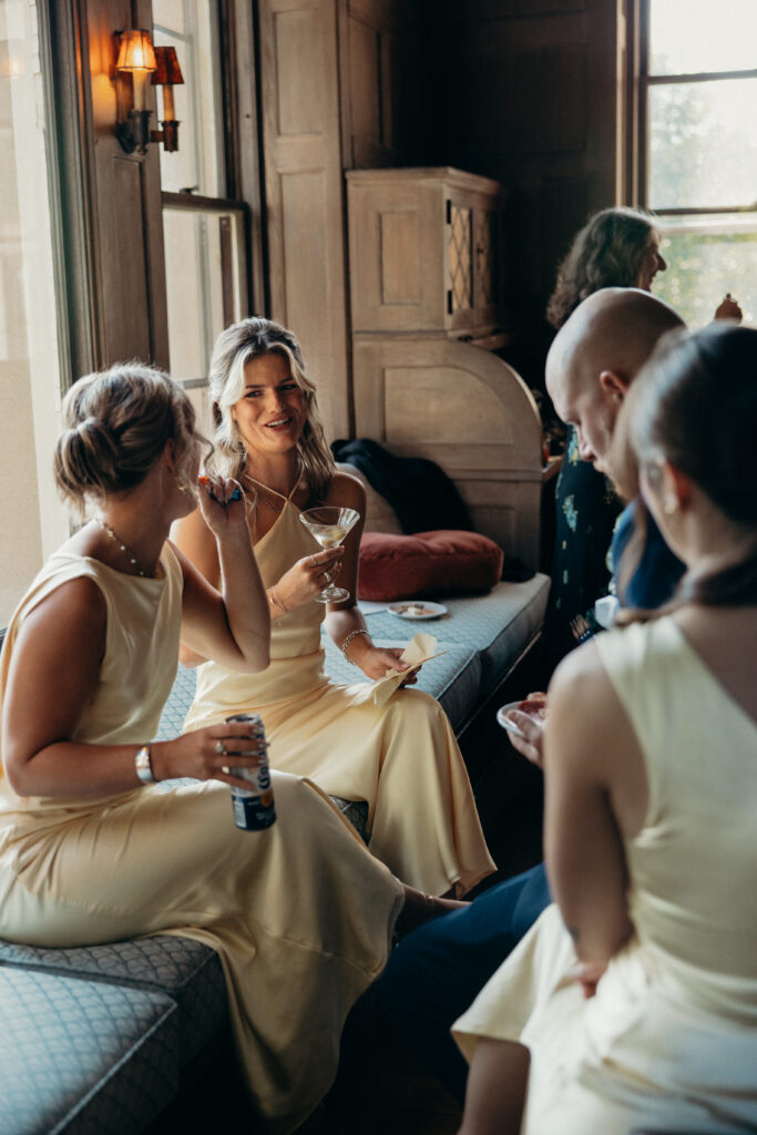 Bridesmaids and guests interacting at Arrow Park New York wedding