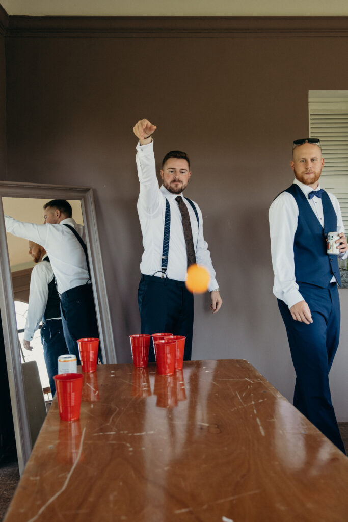 Groomsmen playing beer pong at Arrow Park New York wedding