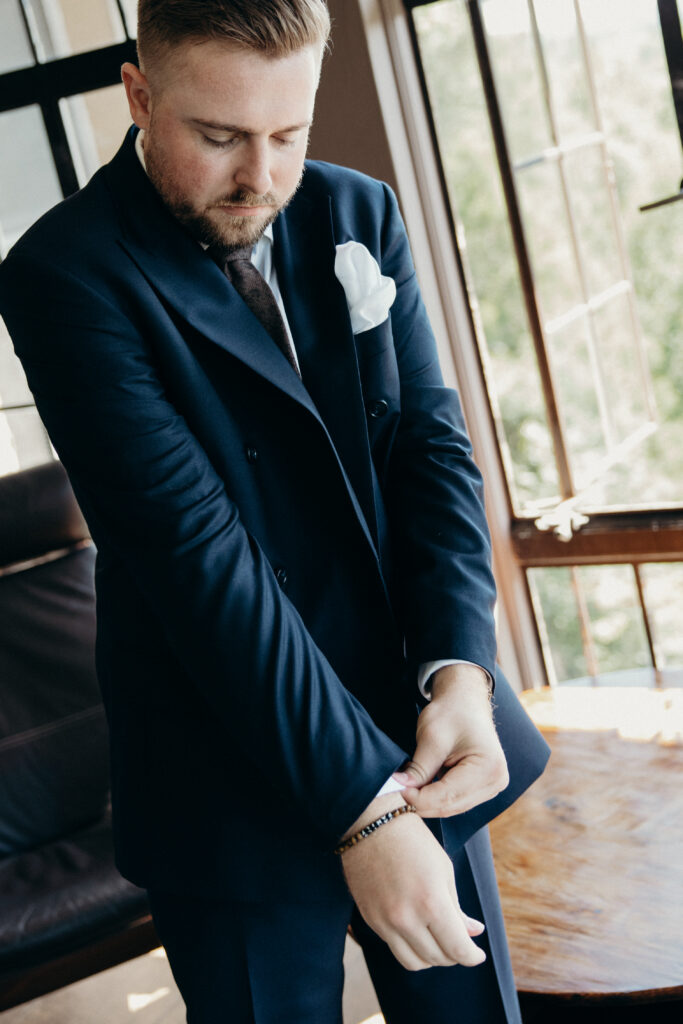Groom getting ready at Arrow Park New York