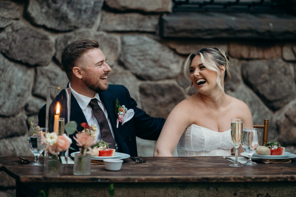 Couple sitting during wedding reception at Arrow Park New York