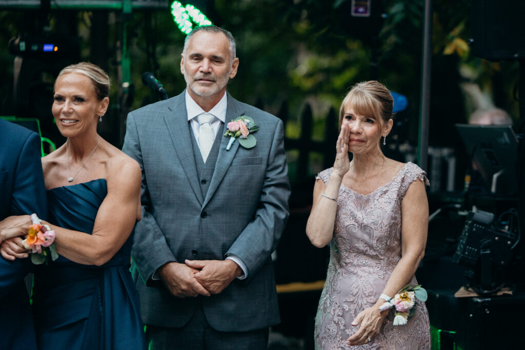 Mom of newlyweds crying during wedding reception at Arrow Park New York