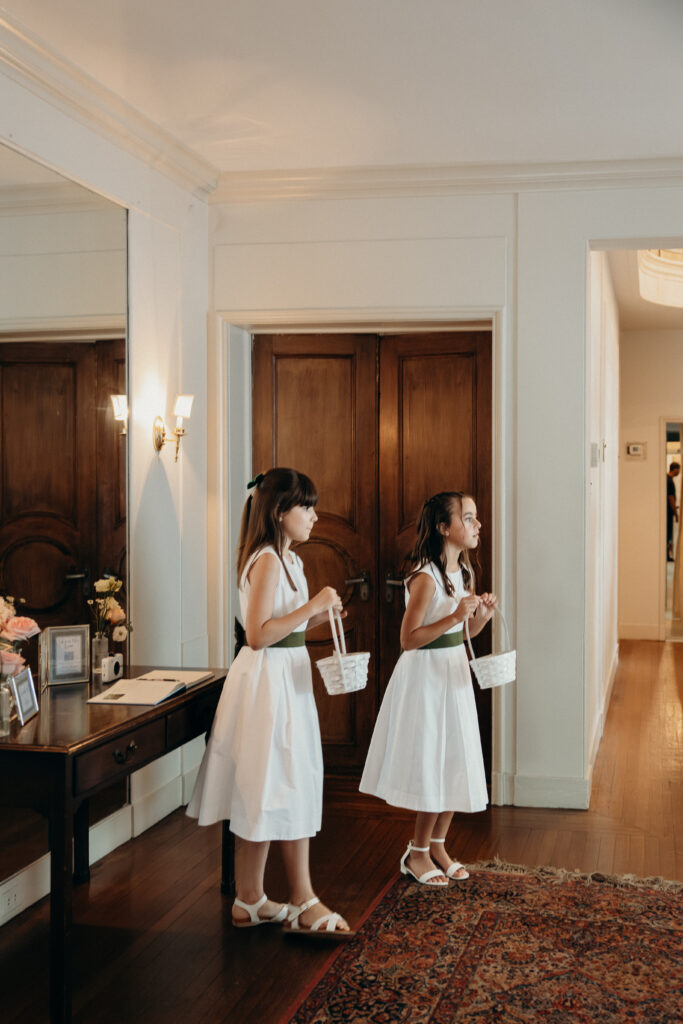 New York flower girls waiting for their turn at The Willows wedding ceremony