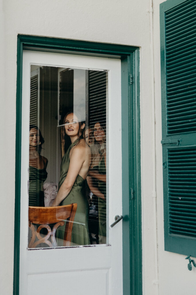 New York bridesmaids standing indoors at The Willows wedding