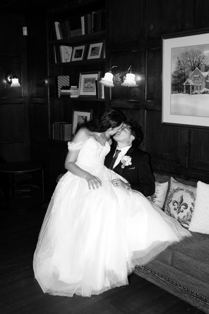 New York couple sharing a kiss at their The Willows wedding reception