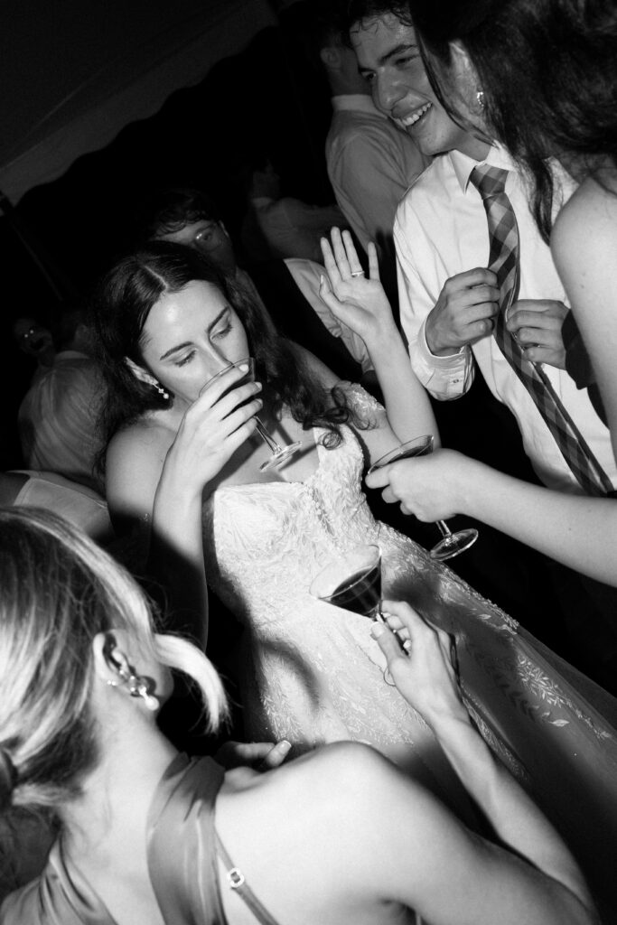 New York bride and guests drinking at The Willows wedding reception