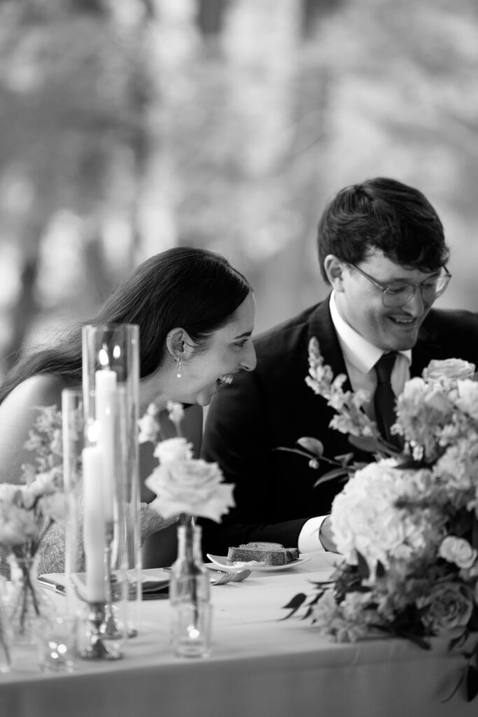 New York couple laughing at The Willows wedding reception
