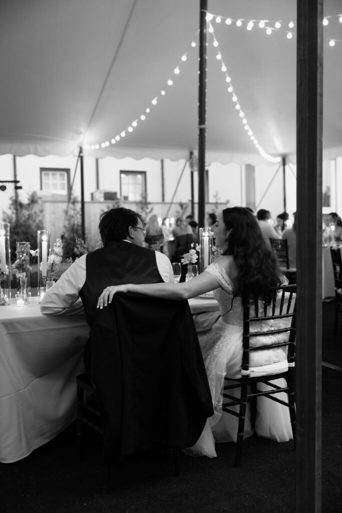New York couple sitting at The Willows wedding reception