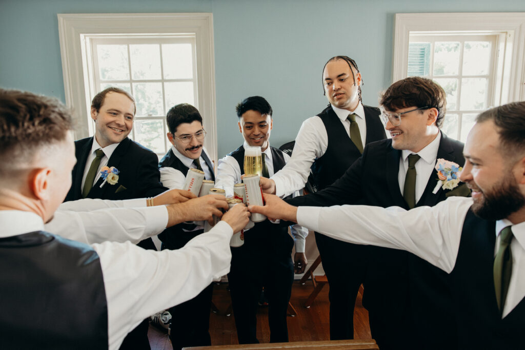 Groom and groomsmen toasting before the wedding ceremony at The Willows in New York