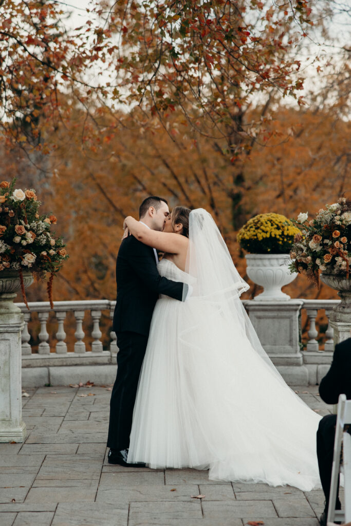 Wedding first kiss at Tarrytown House Estate in New York