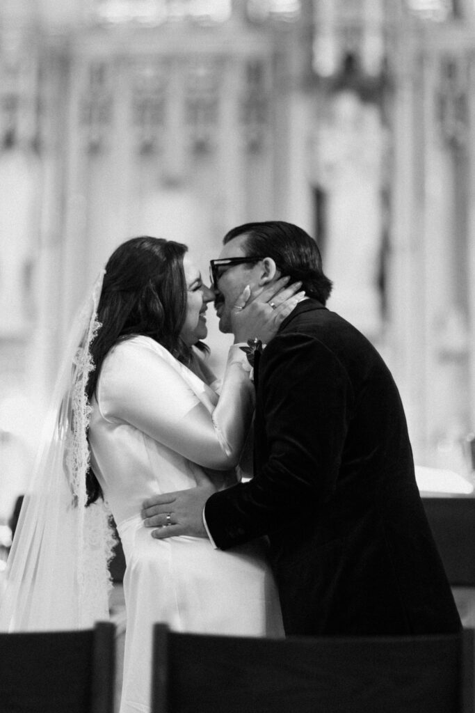 Couple first kiss at a New York church wedding