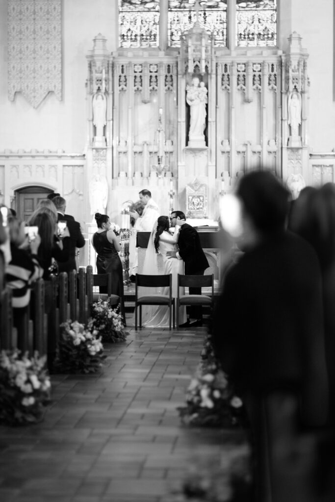 Couple first kiss at a New York church wedding