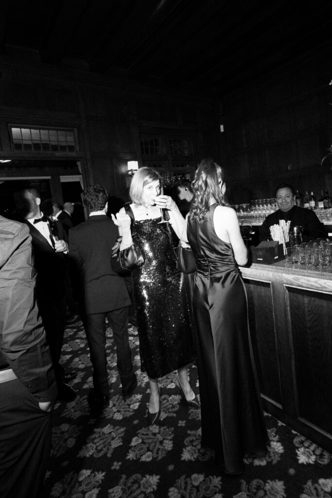 People interacting at Le Chateau New York during cocktail hour