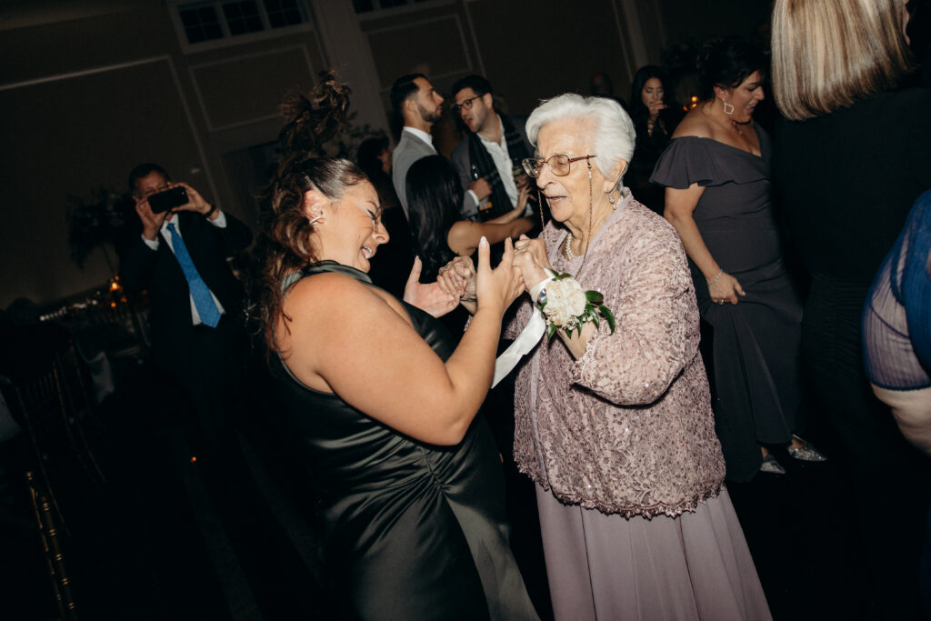People partying at Le Chateau New York during wedding reception