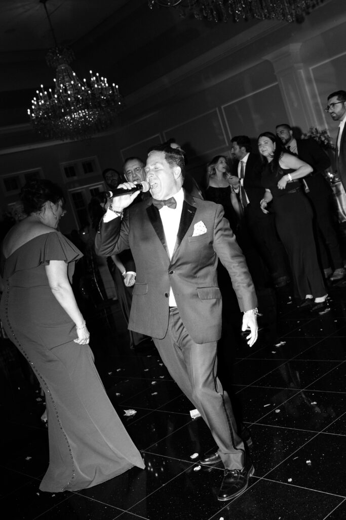 People partying at Le Chateau New York during wedding reception
