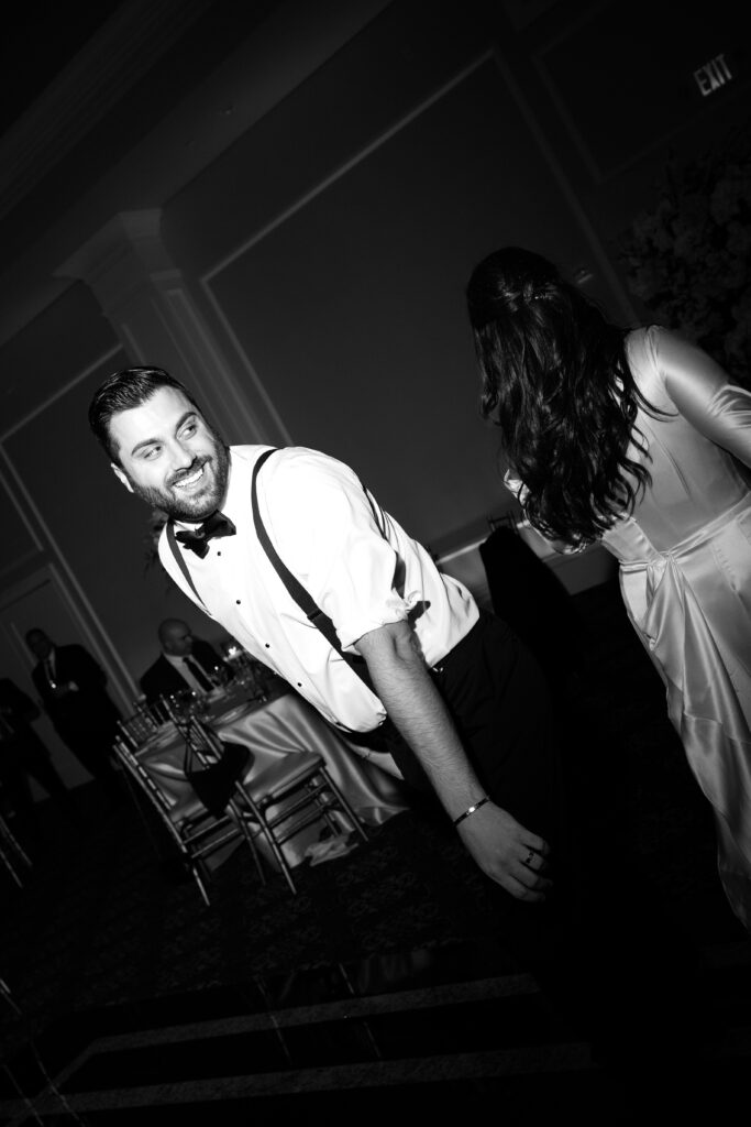 People partying at Le Chateau New York during wedding reception