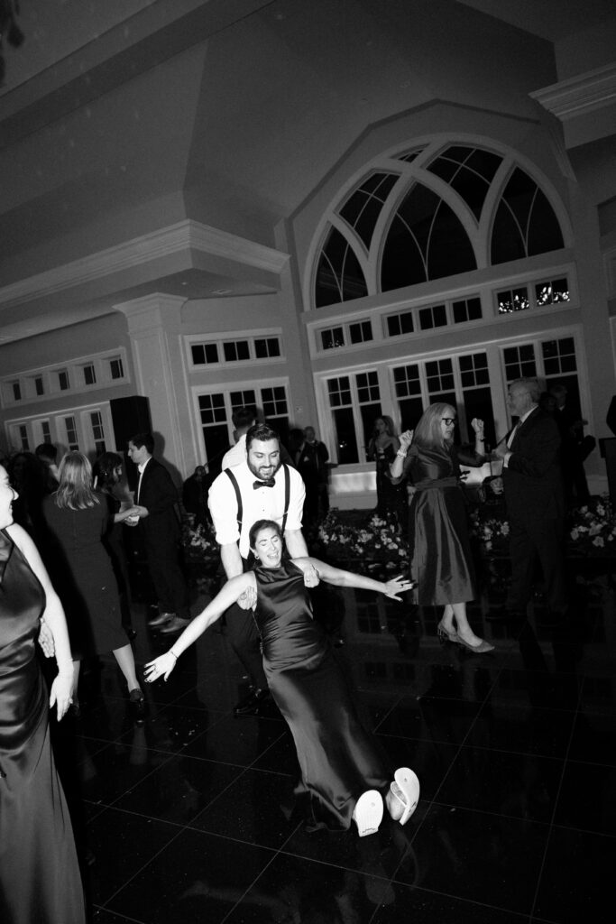 People partying at Le Chateau New York during wedding reception