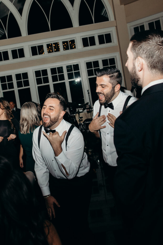 People partying at Le Chateau New York during wedding reception