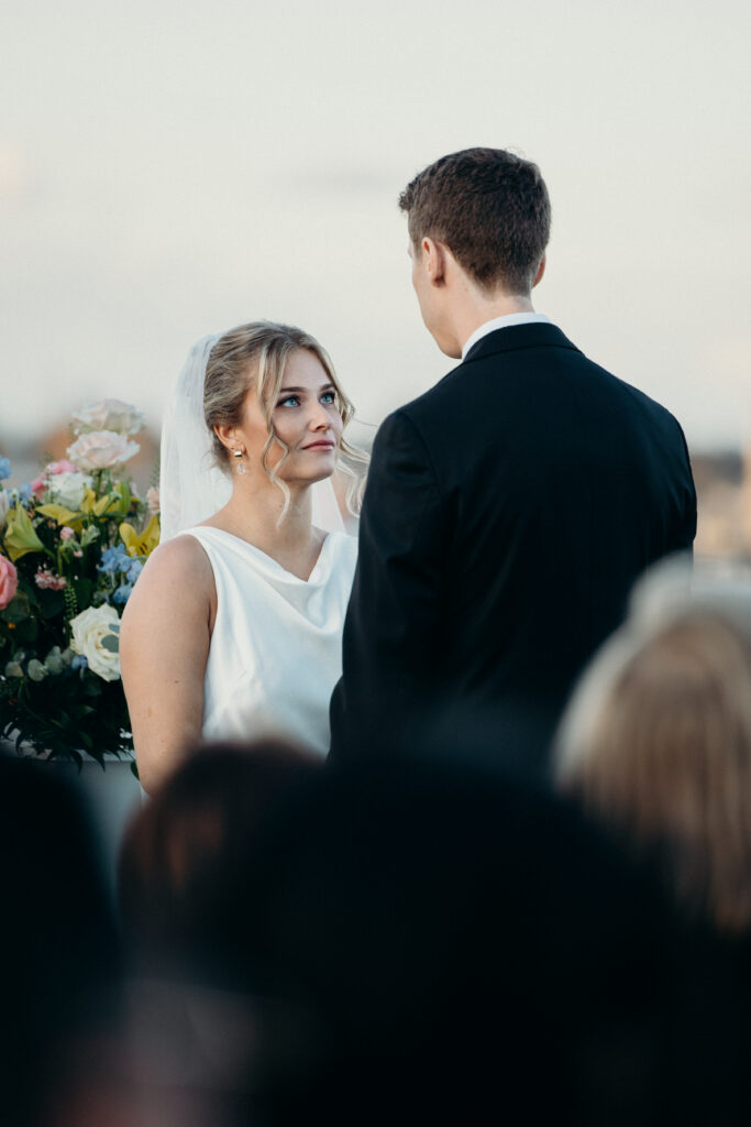 Bride gazing at her groom during The Asbury Hotel wedding ceremony
