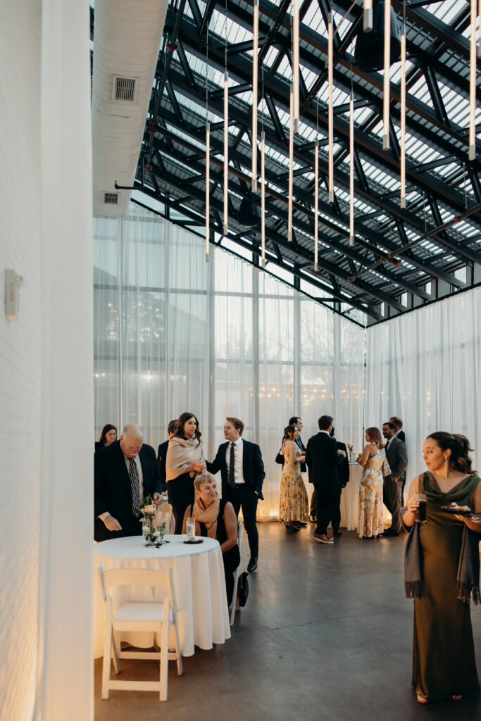 Wedding guests mingling at The Asbury Hotel reception in Asbury Park