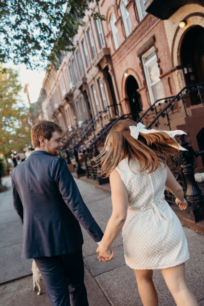 Couple portraits with their dog by a Brooklyn elopement photographer