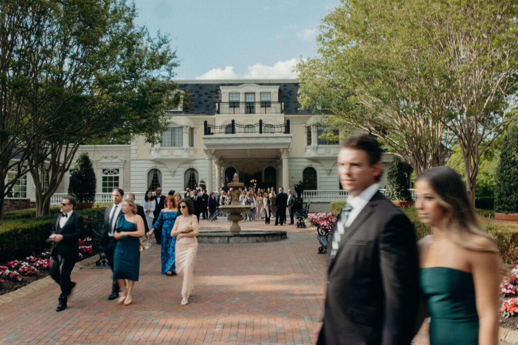 Wedding guests arrive outside The Ashford Estate before Shay and Kevin's ceremony
