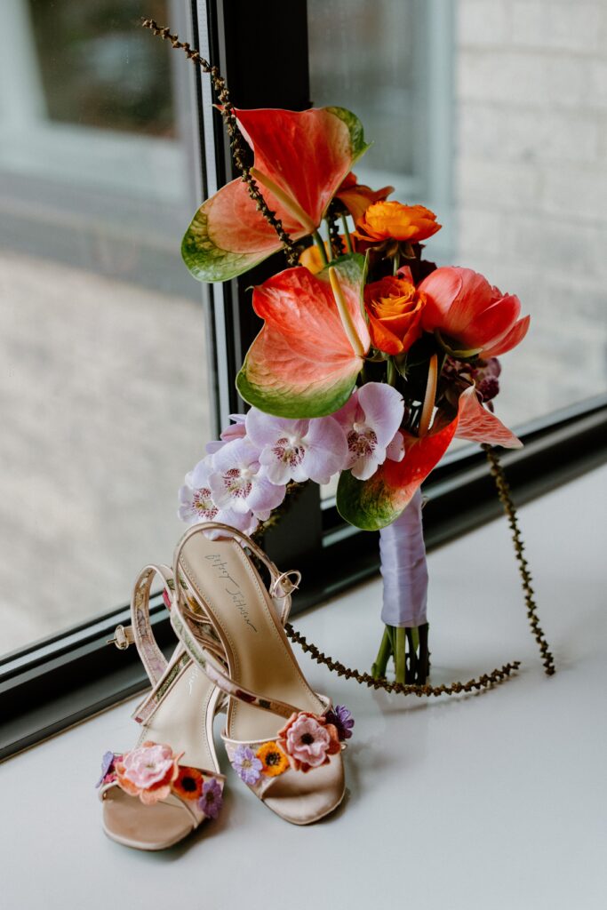 Wedding bouquet and floral shoes at Le Bilboquet, New York City
