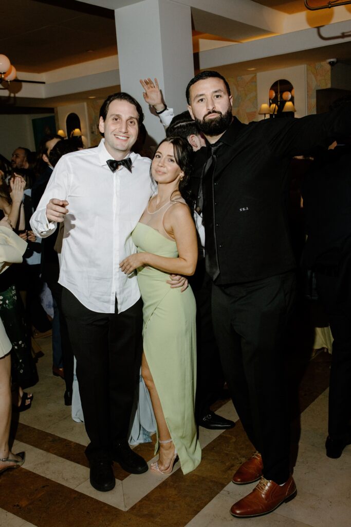 Wedding guests posing together at Le Bilboquet