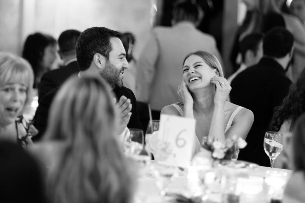 Guests Laughing During Dinner at Le Bilboquet