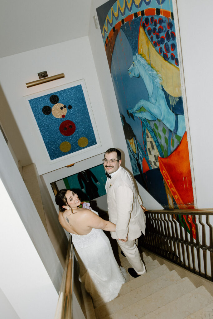 Bride and groom on the staircase at Le Bilboquet
